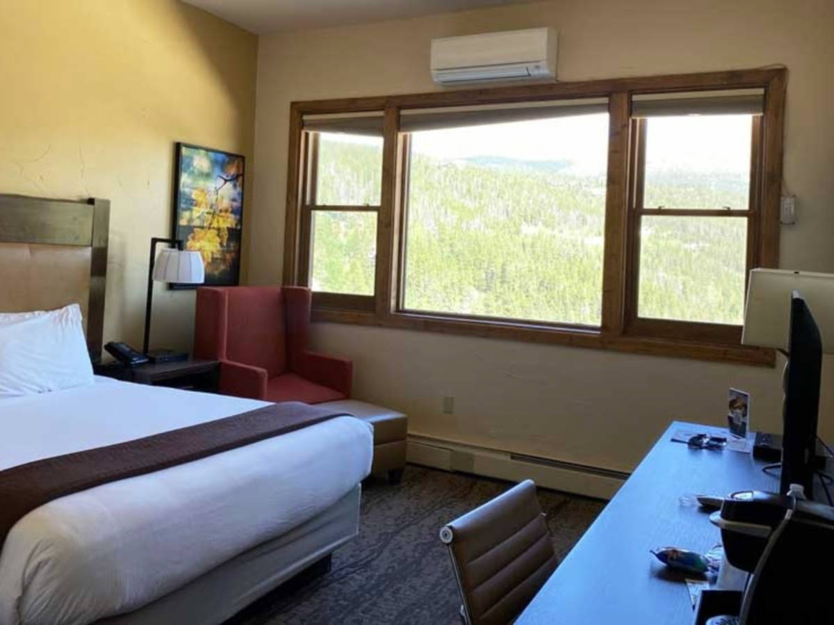 View of the huge bed and windows in The Lodge at Breckenridge