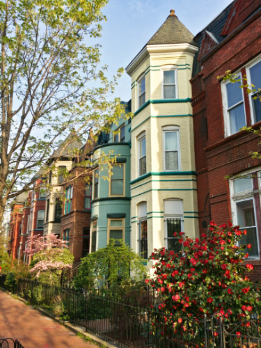 View of the colorful row houses on a sunny day