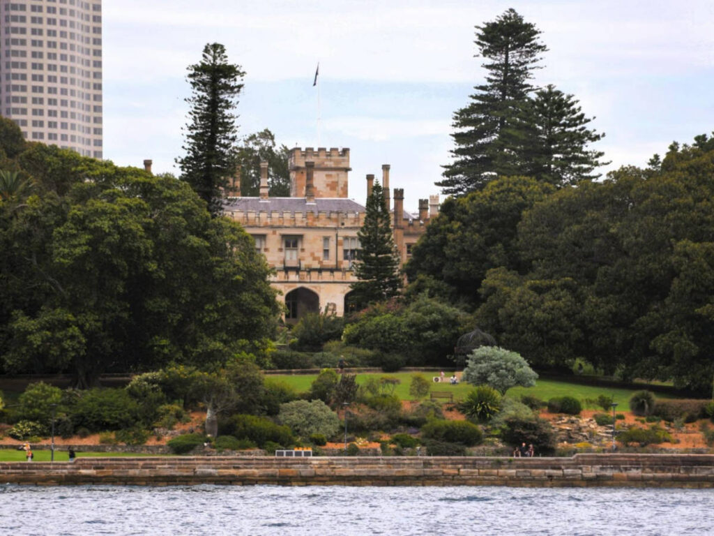 View of the Royal Botanic Gardens of Sydney behind the lush greenery