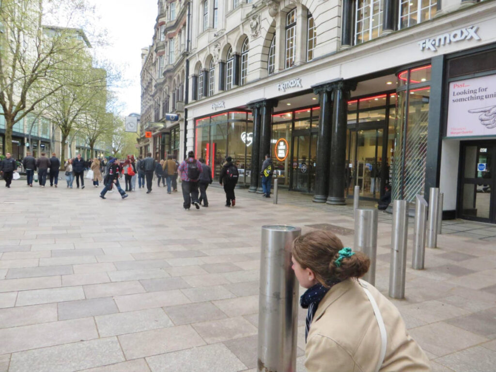 The author Ruthie Walters, peeking through the bollards on The Hayes