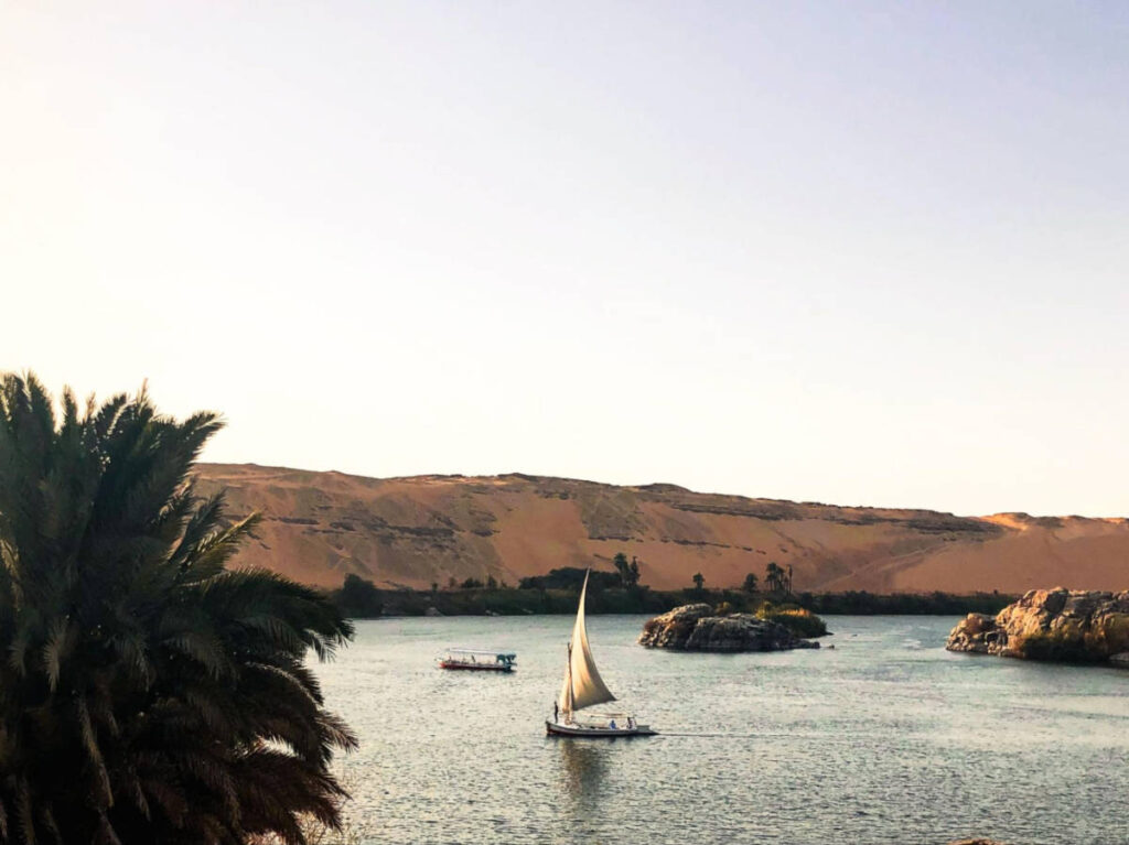 A traditional sail boat on the Nile at sunset