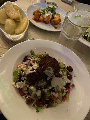 A plate of Fresh falafel salad from Aliada