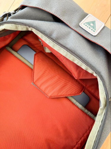 A laptop on the laptop sleeve inside the Salkan Carry-On Backpack