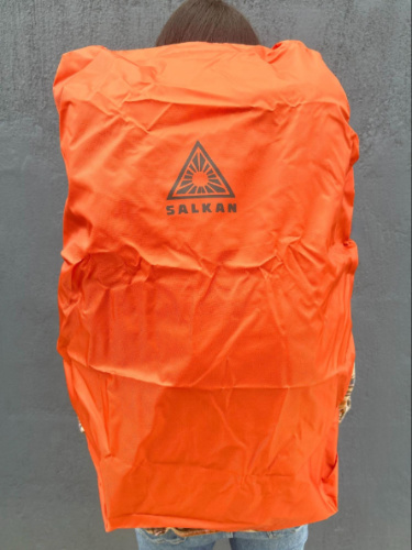 The Salkan Carry-On Backpack with its rain cover