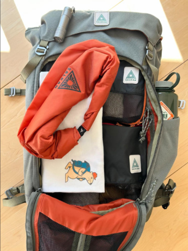 Salkan packing cubes inside the Salkan Carry-On Backpack