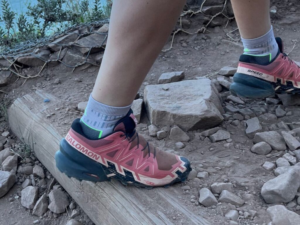 A person wearing Salomon Shoes