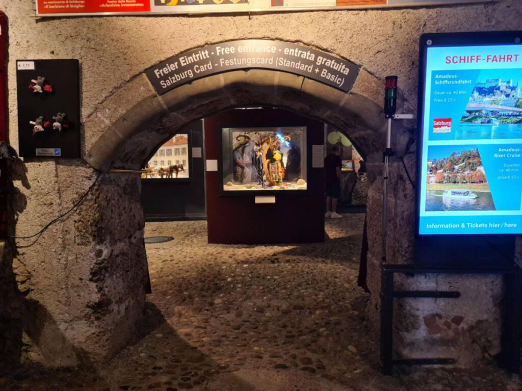 An archway with free entry signages in Salzburg