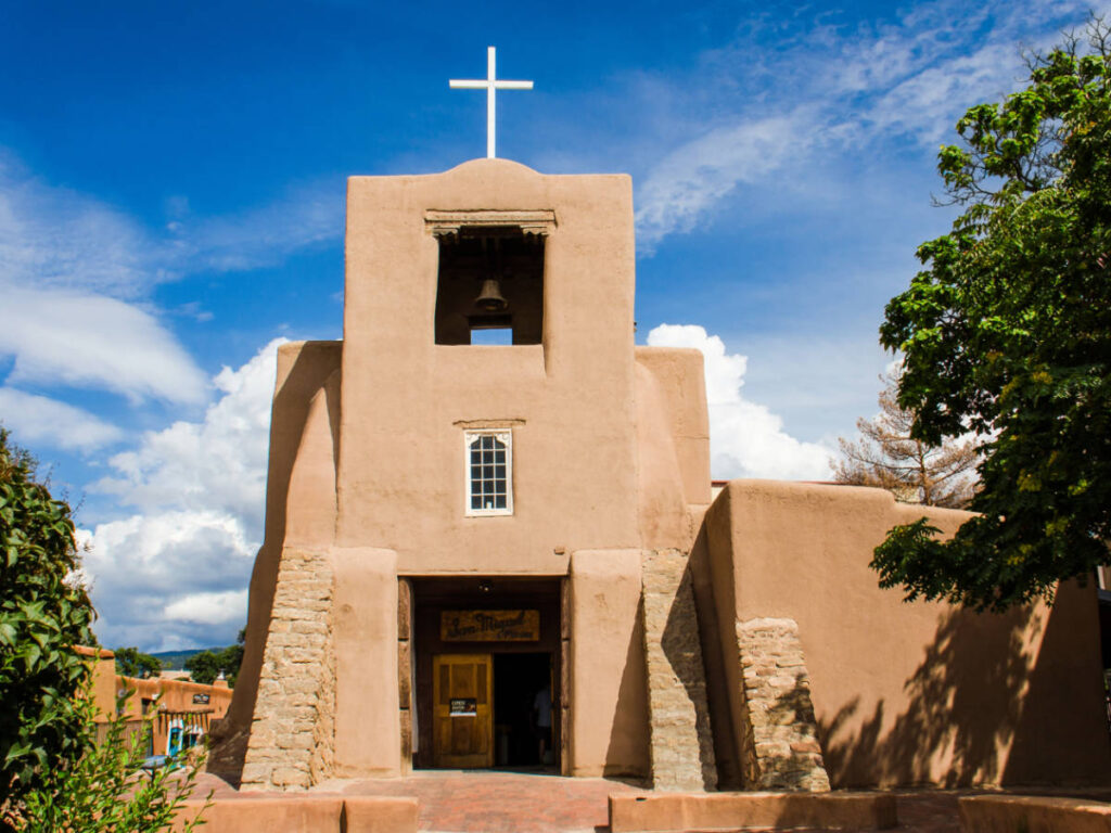 Exterior view of the adobe pueblan style San Miguel Mission Chapel