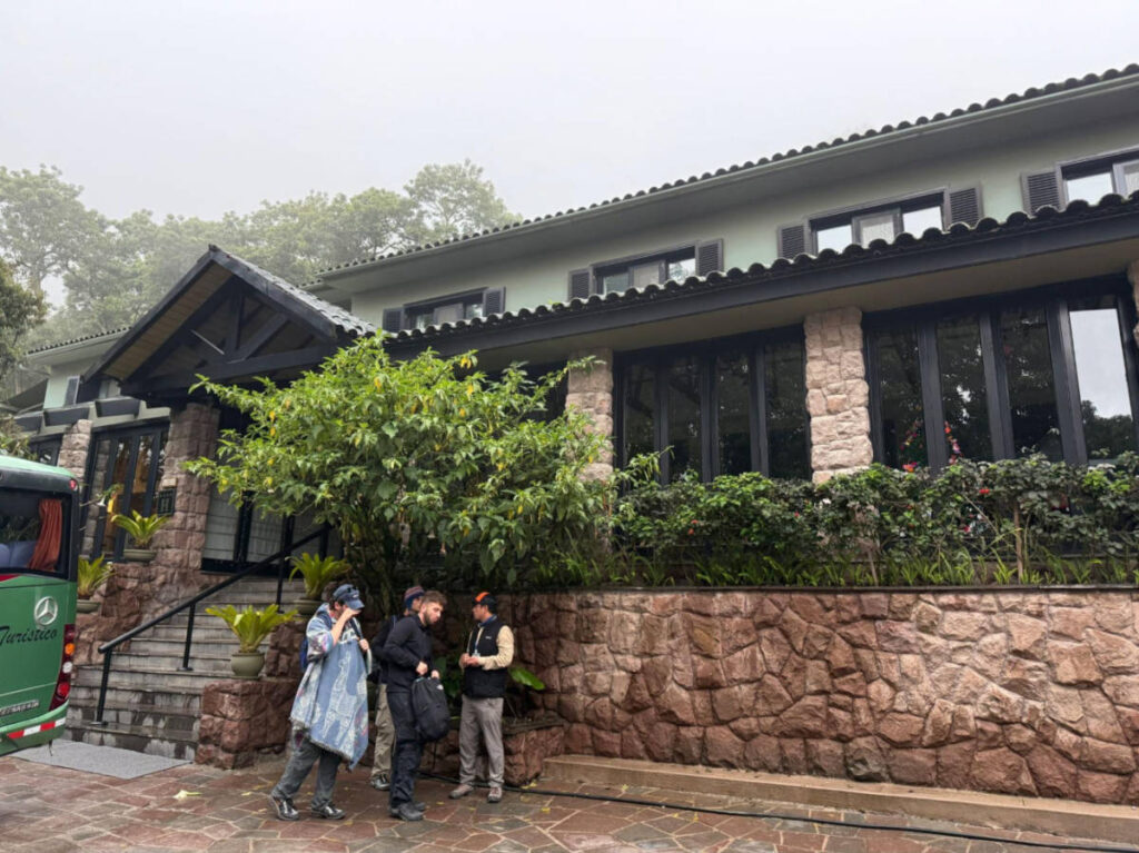 A group of people in front of the Sanctuary Lodge