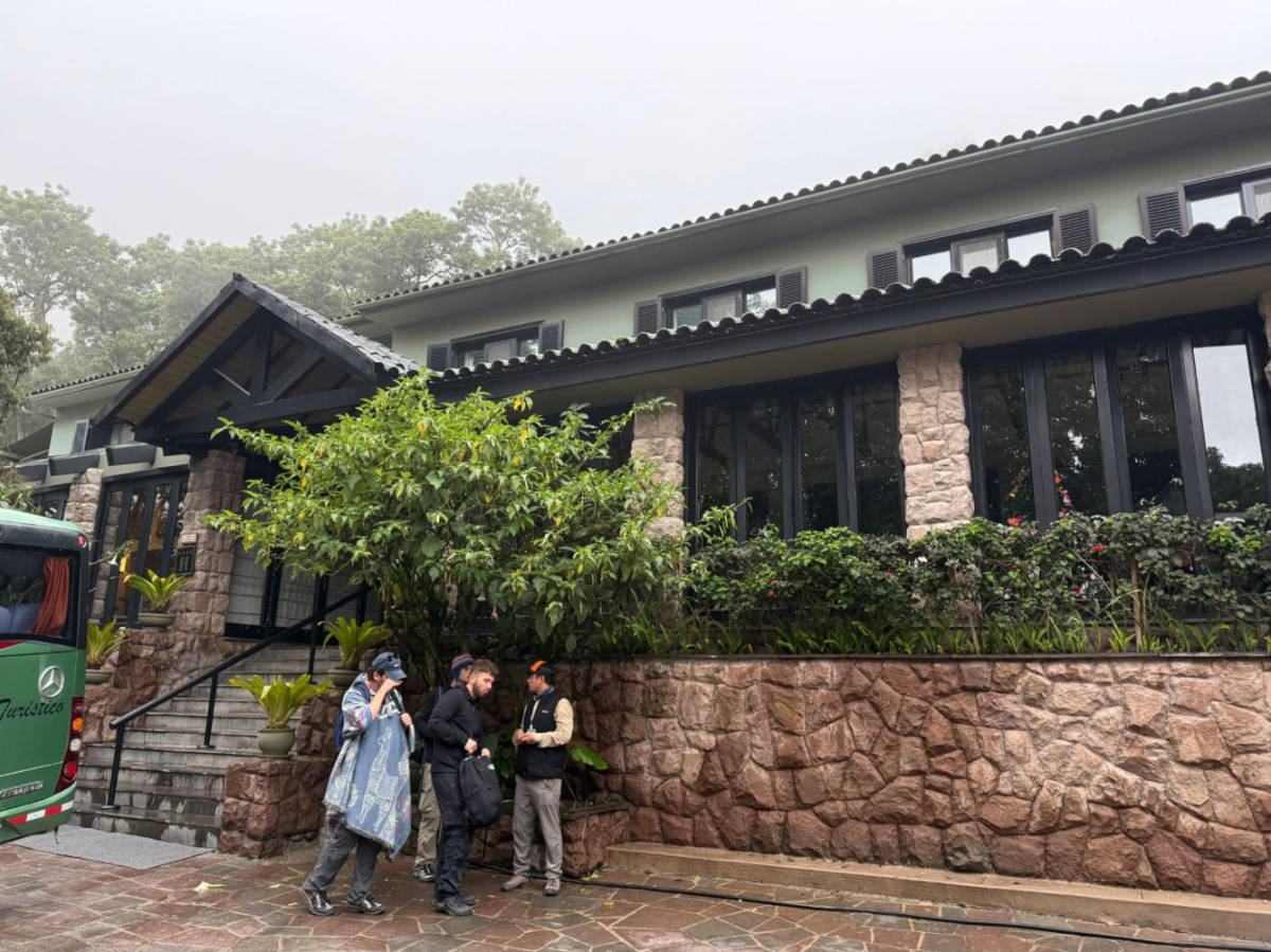 A group of people in front of the Sanctuary Lodge