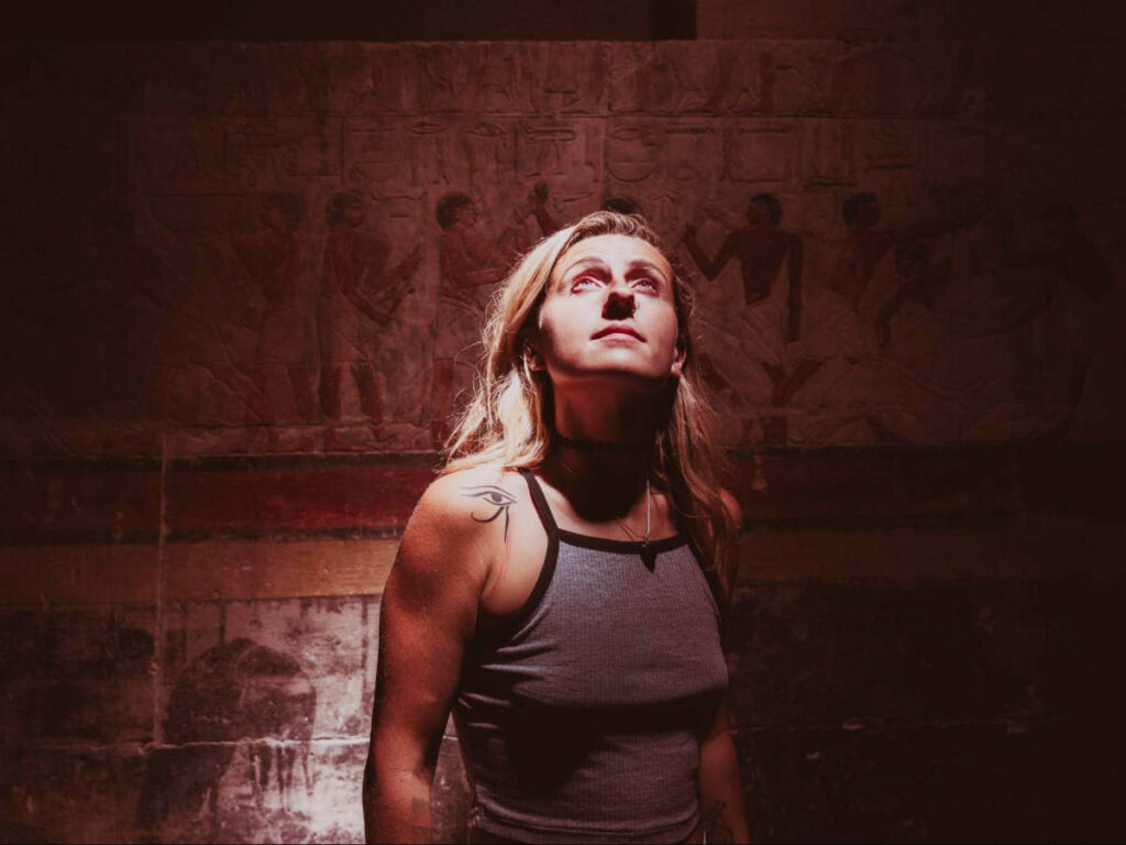 The author, Kate McMahon at an ancient tomb at Saqqara Necropolis