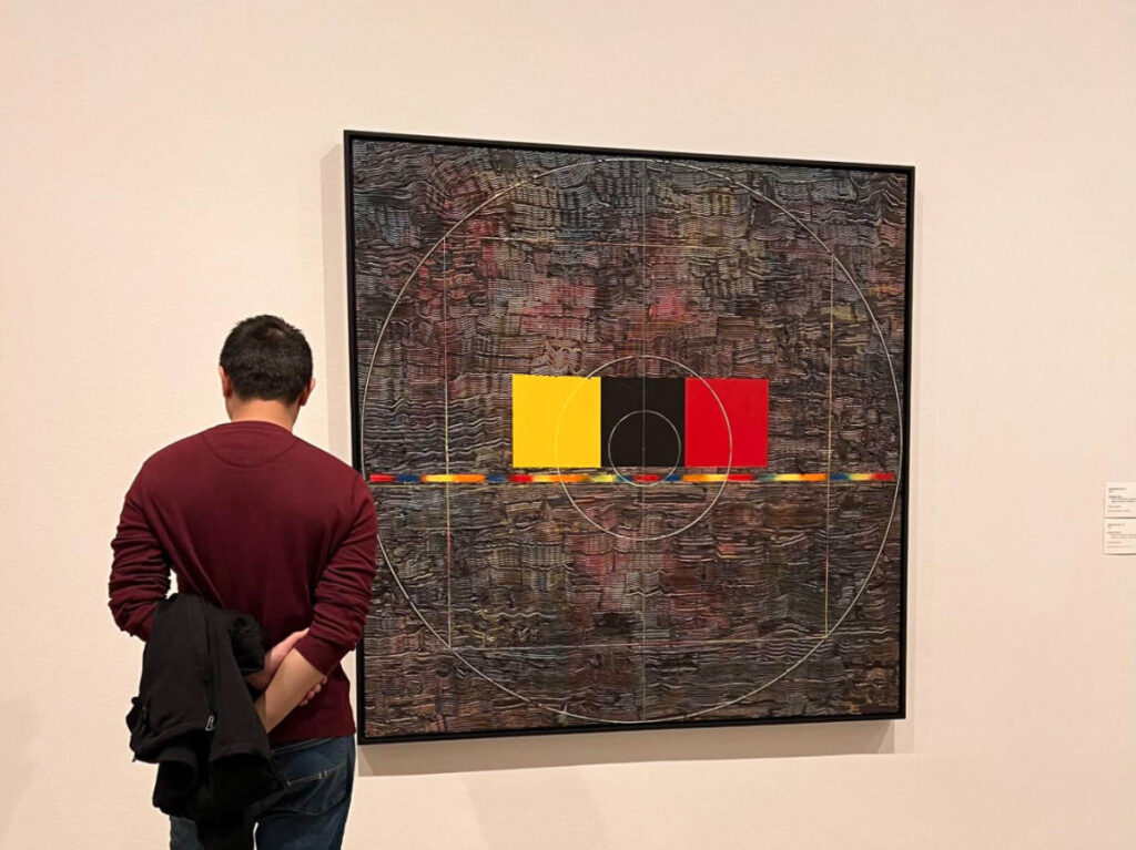 The author Sarah Heath’s partner, enjoying the exhibit at The Dallas Museum of Art