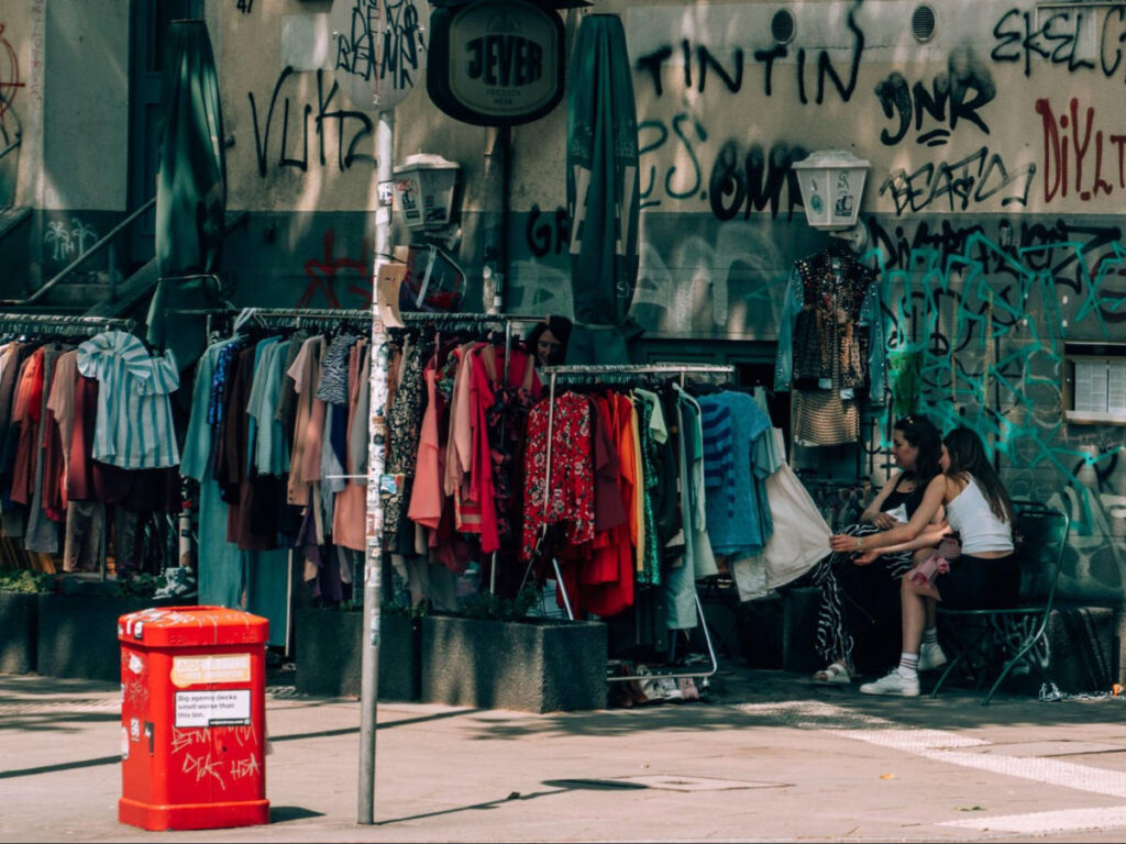 Women checking out the the vintage shop at the side of the street in Schanzenviertel