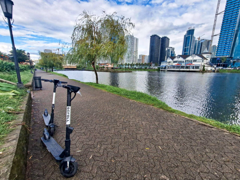 View of the scooters parked near the river in Batumi