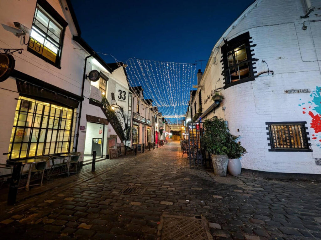 View of the cobblestone street at night