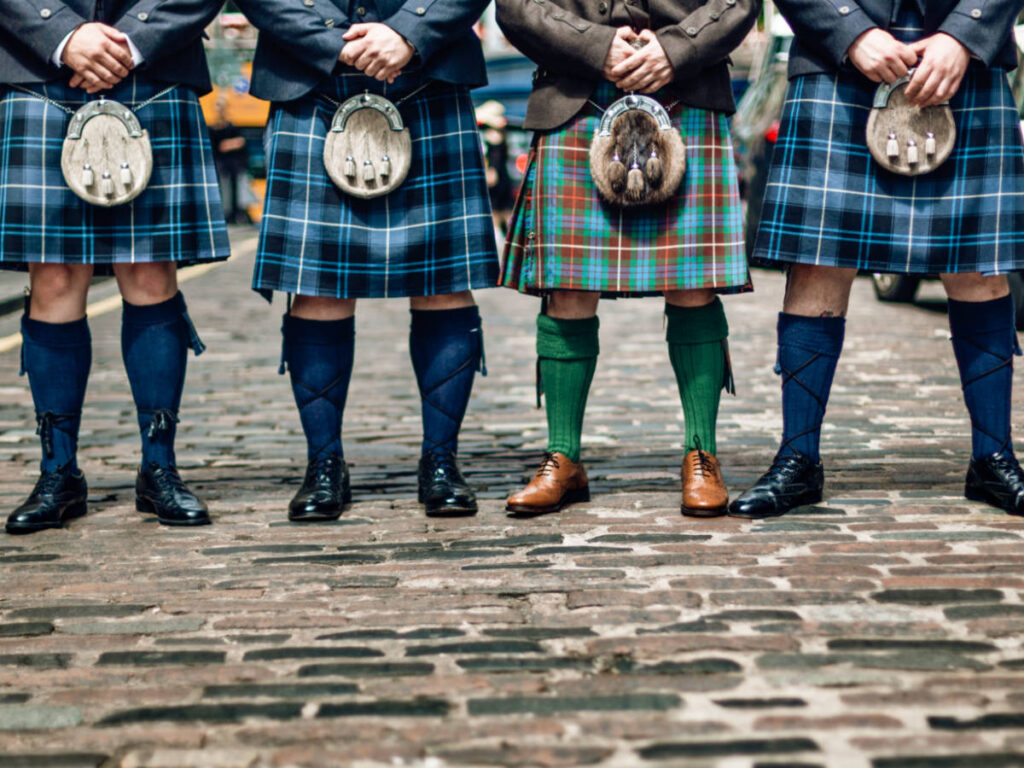 View of the bottoms of the Scotsmen wearing kilt