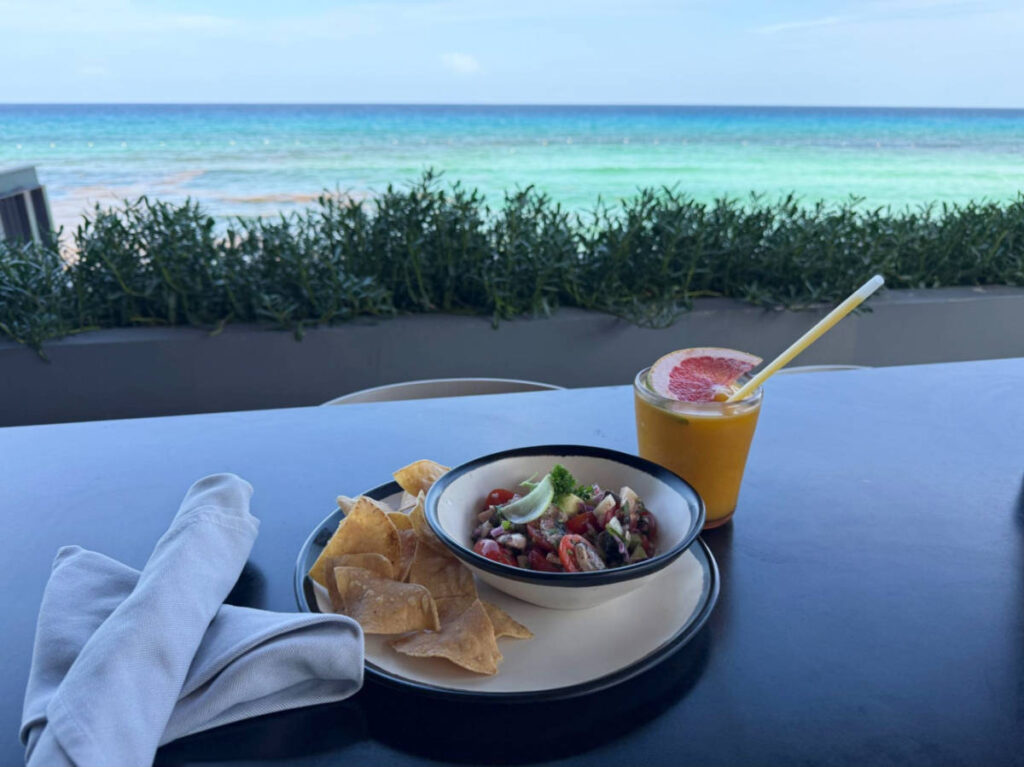 A seaside snack with drink at the Cevichería by la Isla