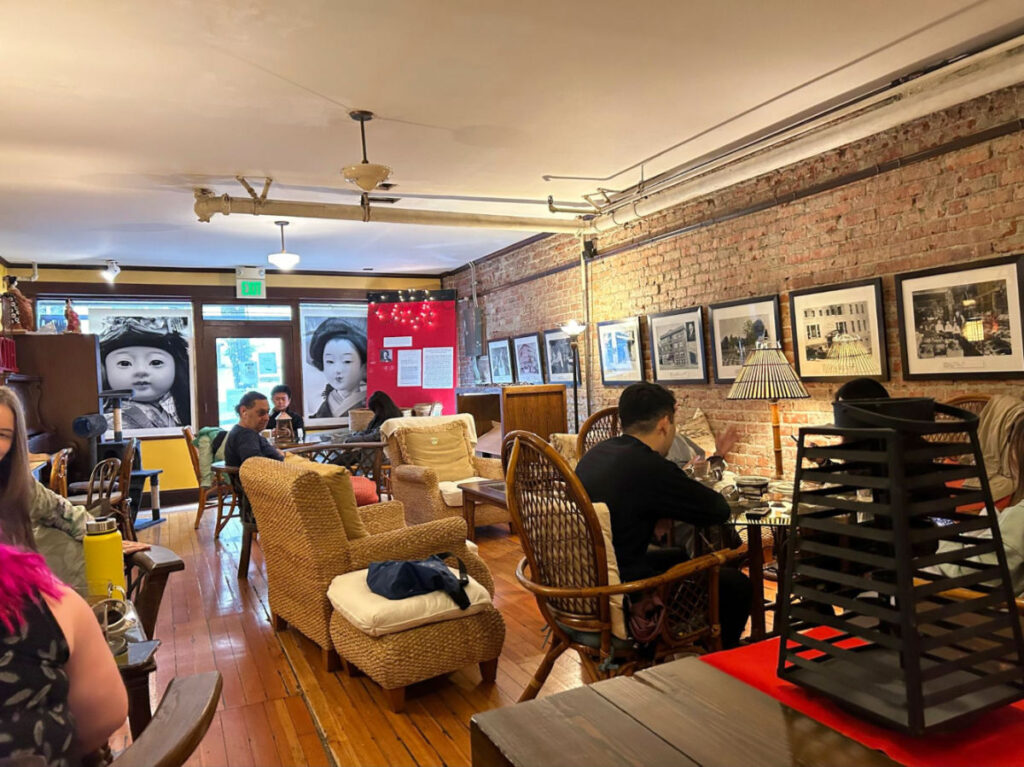 People dining at the cozy basement of Seattle’s Panama Hotel and Teahouse