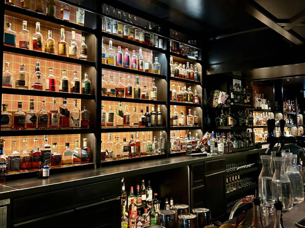 Bottle of liquors displayed at the bar in Seven Grand