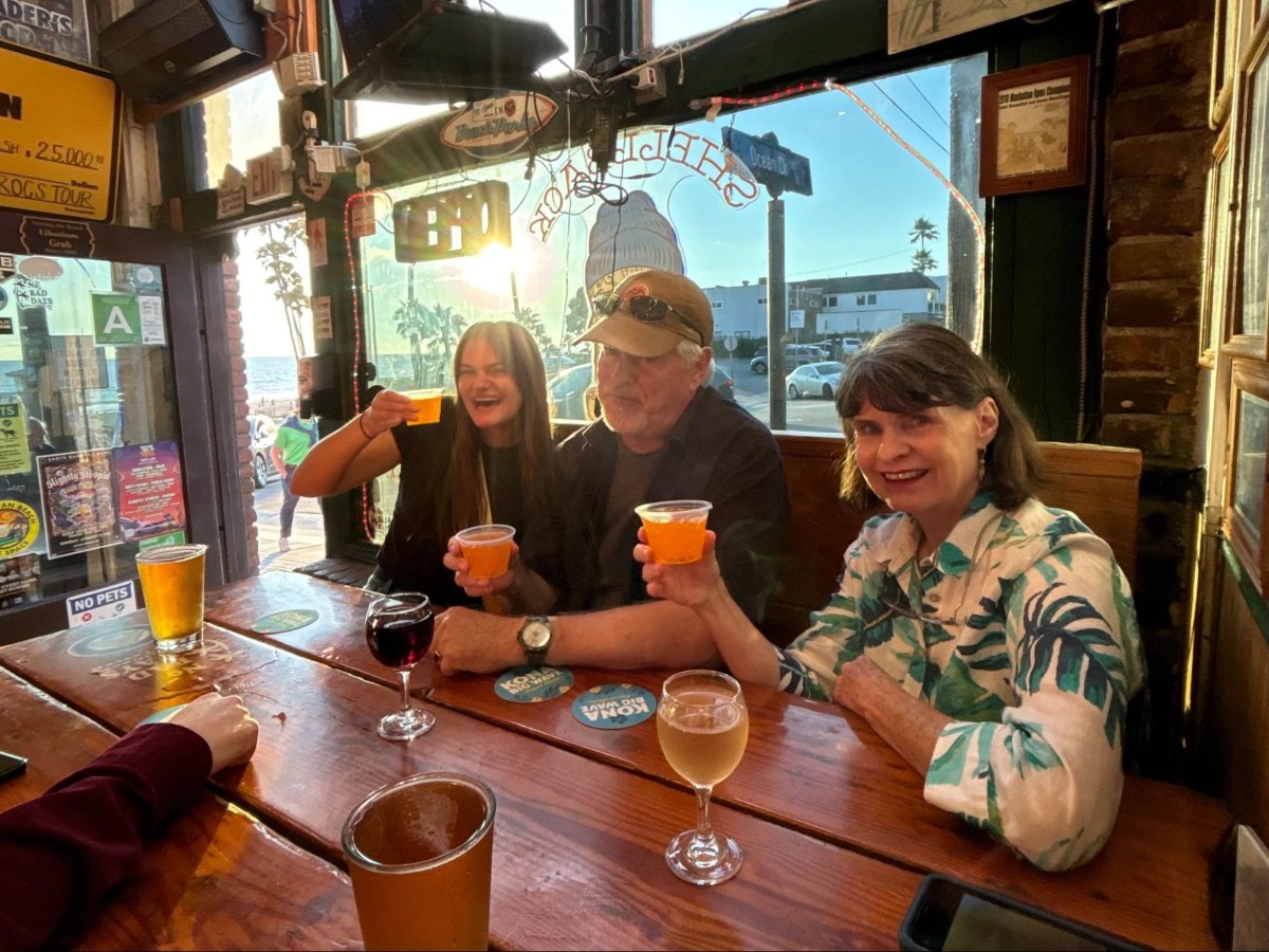 The author's family friends enjoying some drinks at Shellback Tavern