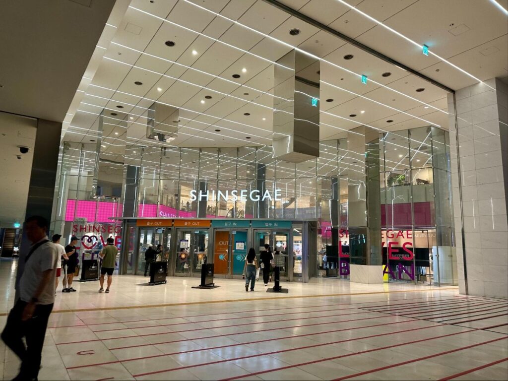View of the entrance to Shinsegae Department Store from the subway