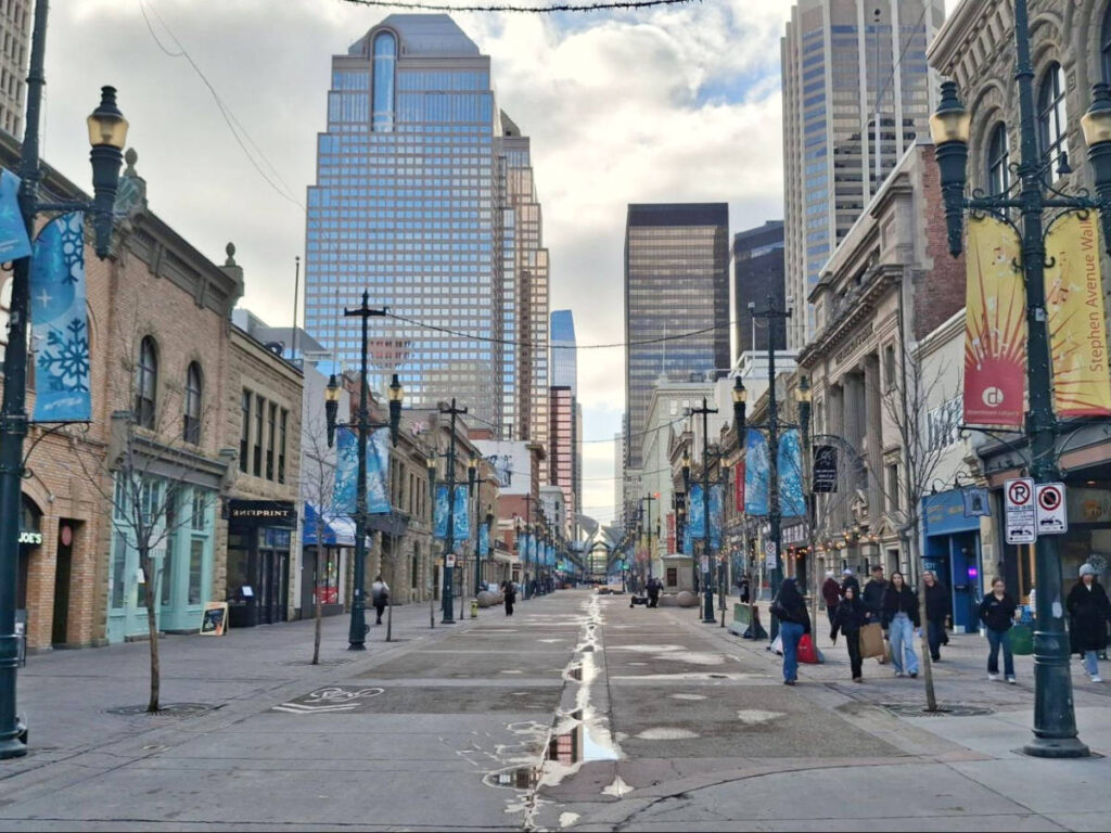 View of the historic buildings converted to shops and the high rises around Stephen Ave.