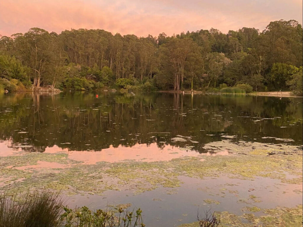 Scenic sunset view reflecting on the water of Lake Anza