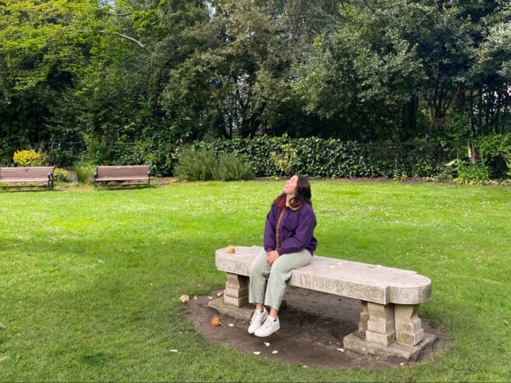 The author's partner admiring the sky in Shakespeare Garden