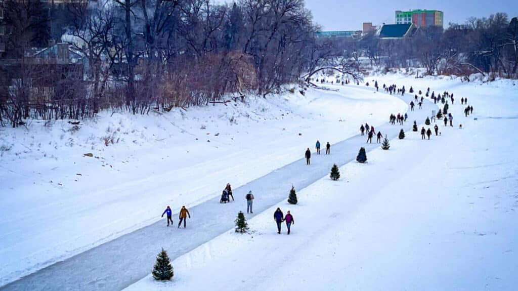 Aerial view of the people skating around Red River Mutual Skating Trail