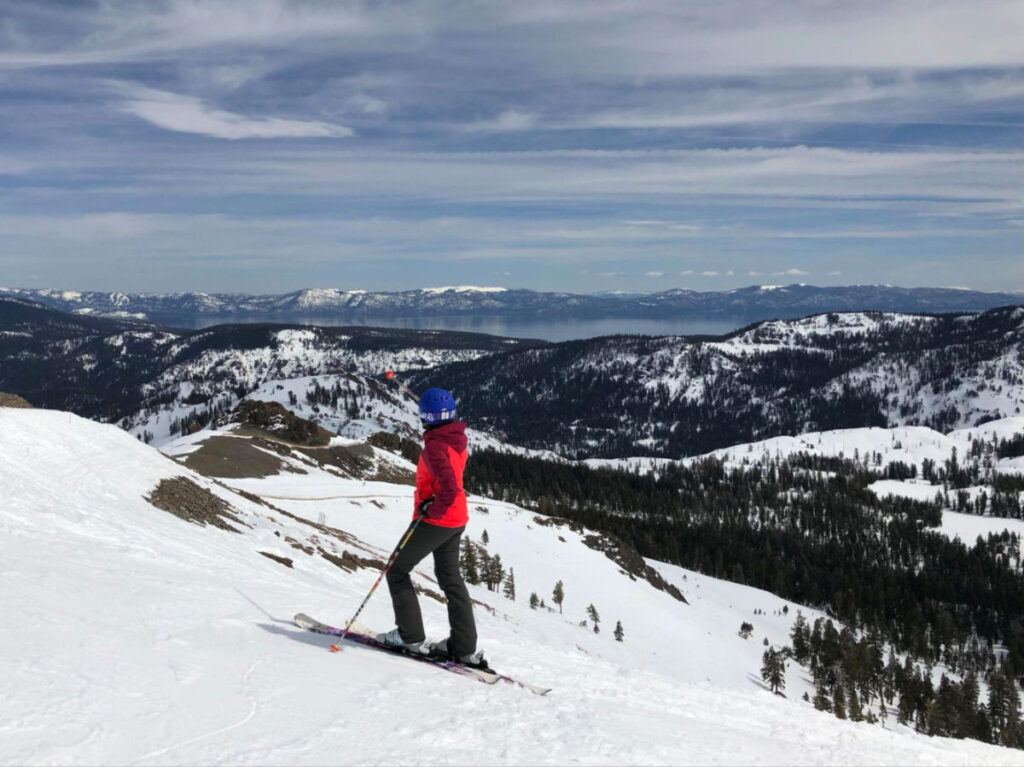 Author's partner skiing at Palisades with views over Lake Tahoe