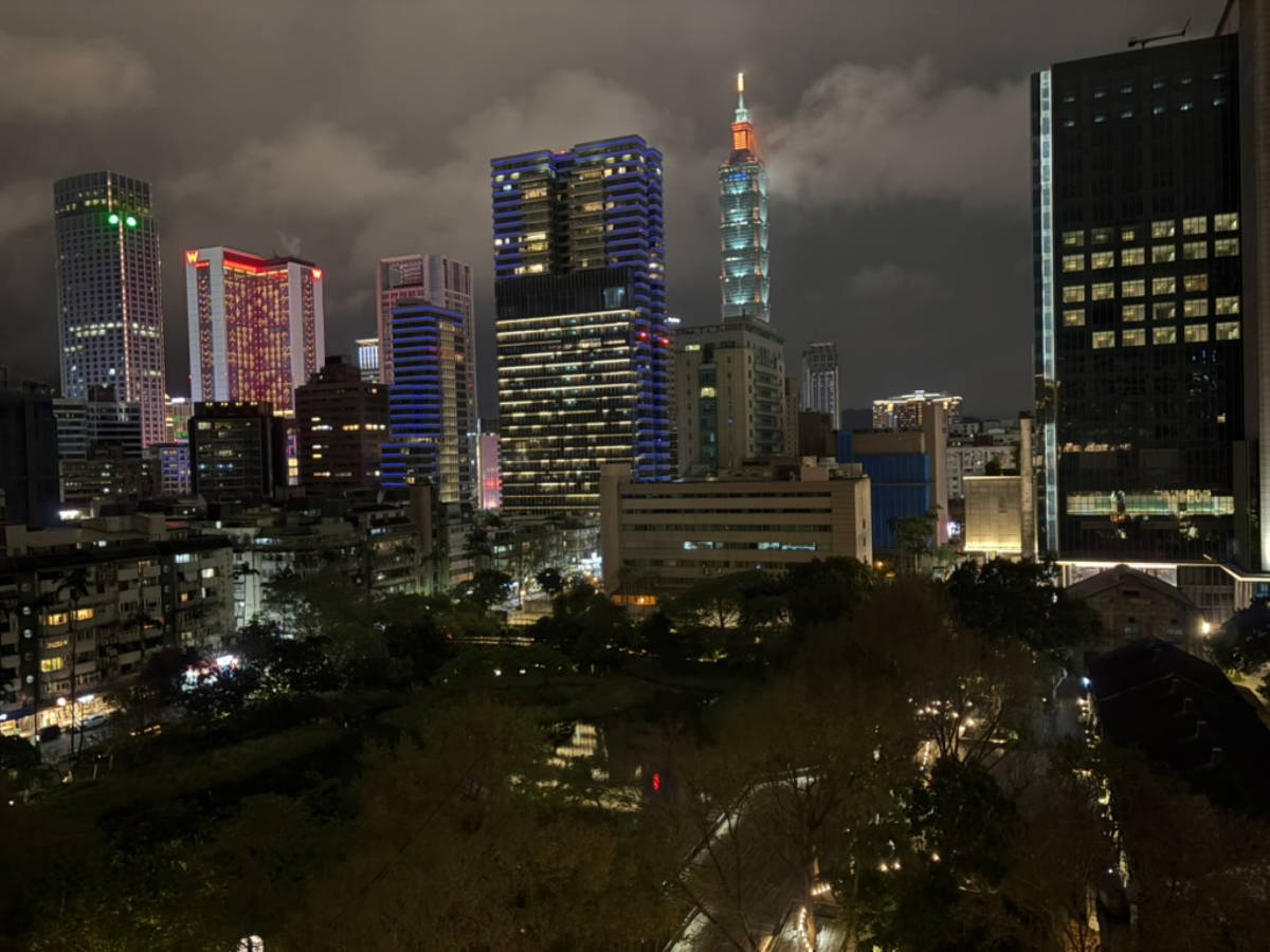 View of the Taipei 101 and the city skyline from the hotel balcony at night