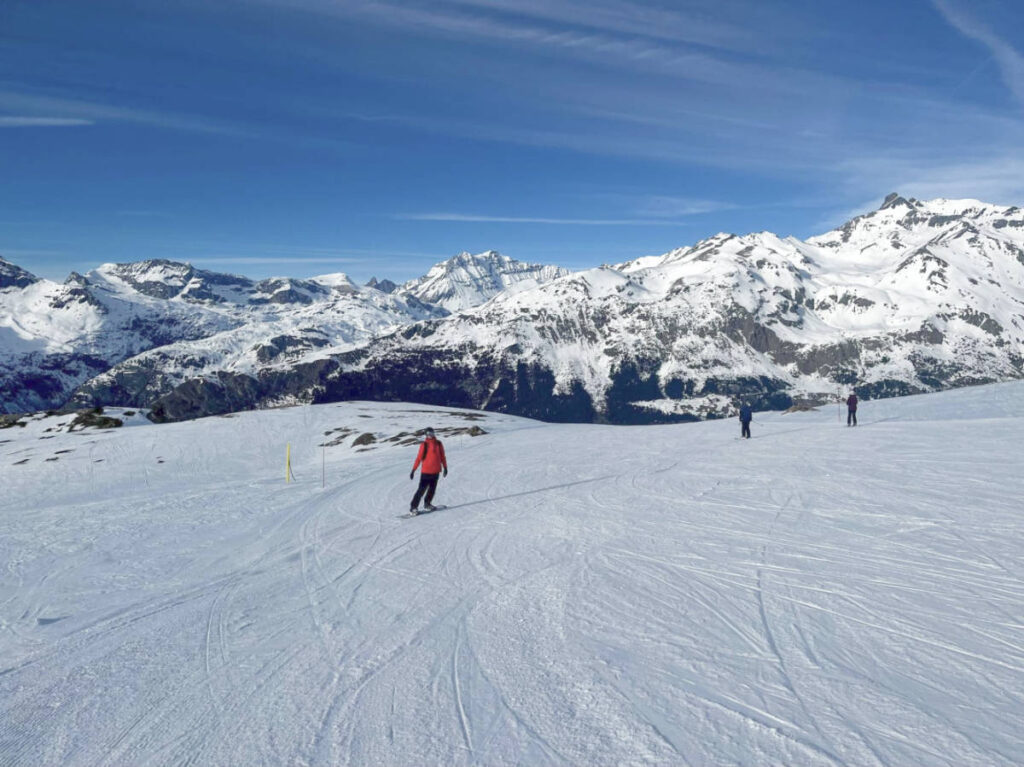 The skiers on the slopes above Termignon