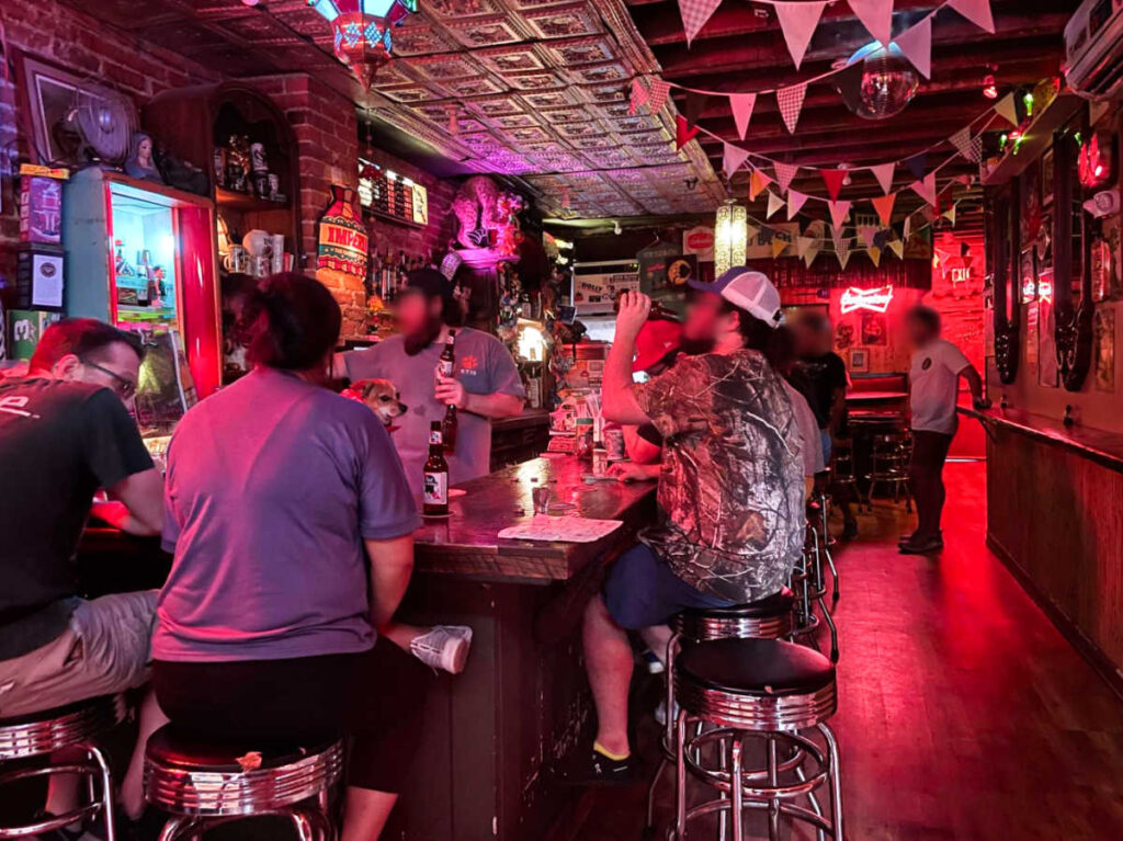 People drinking inside the Snappy’s Small Bar