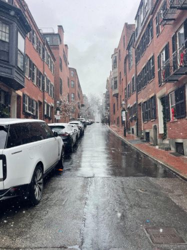 Cars parked at the Beacon Hill street during a snow day
