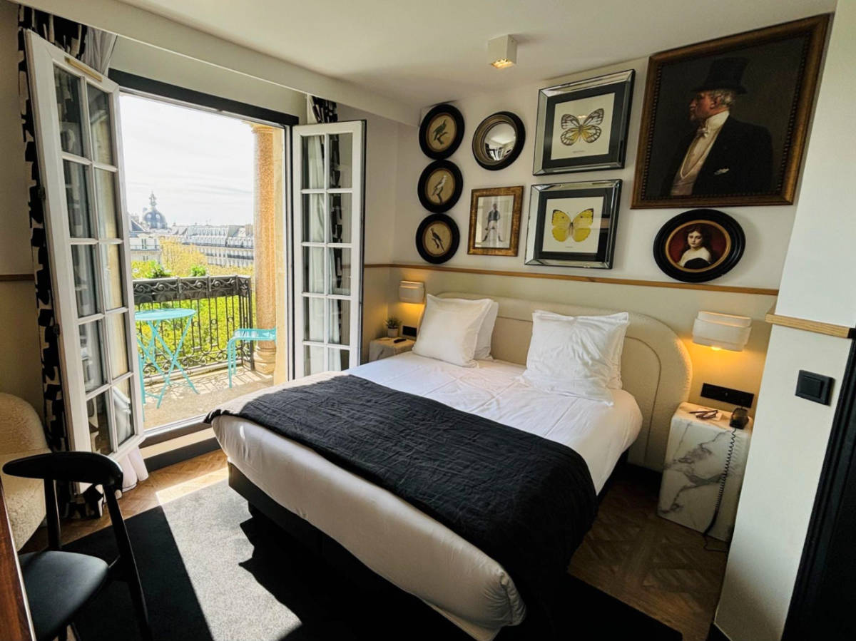 The hotel room with overlooking view from the French doors