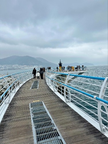 People walking along the Songdo Cloud Walk