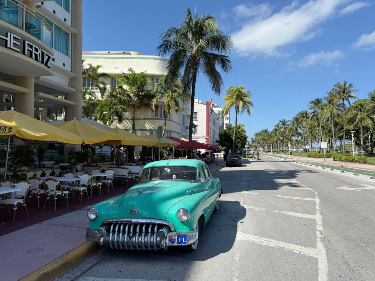 A classic car parked at the South Beach’s Ocean Drive