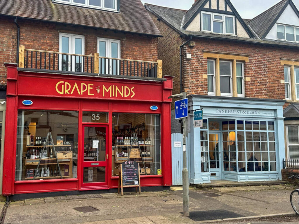 View of the vibrant storefronts along the South Parade in Summertown