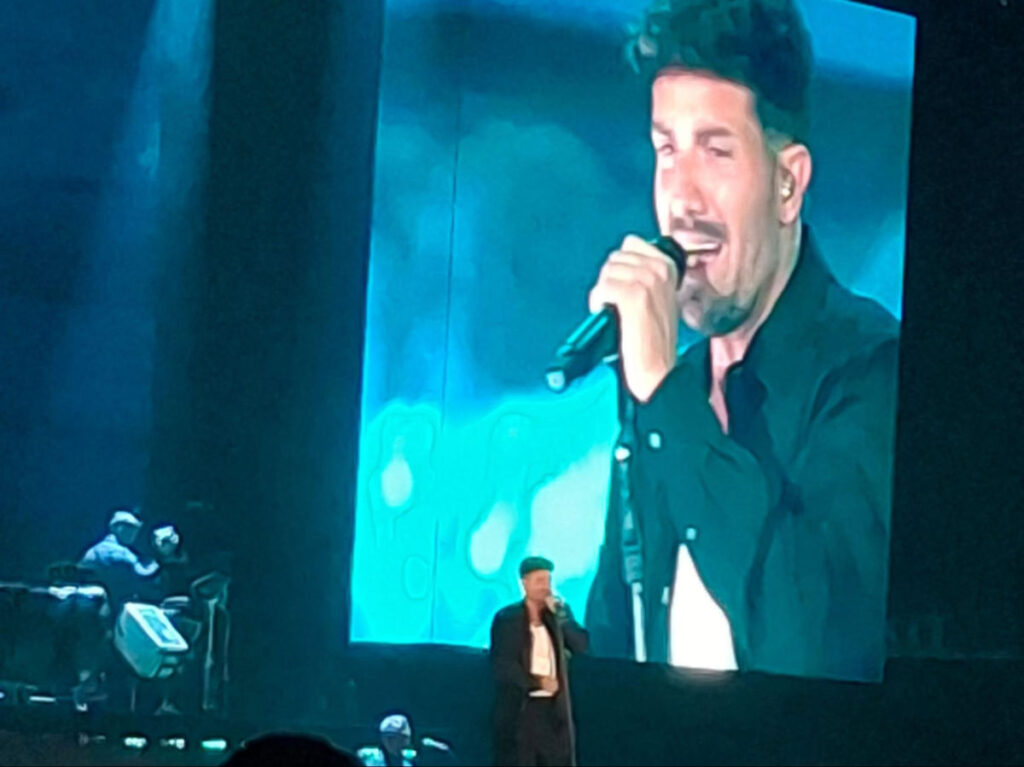 Spanish superstar Pablo Alborán singing on stage at Madrid’s Movistar Arena