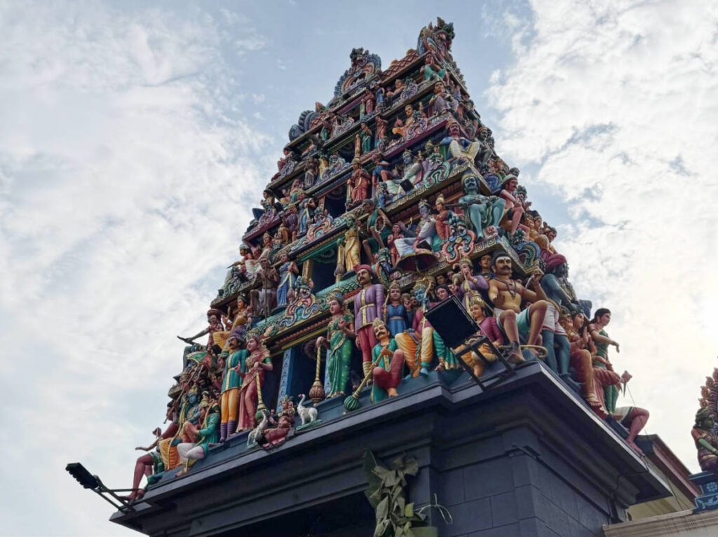 View of the colorful gopurams at the entrance of Sri Mariamman Temple