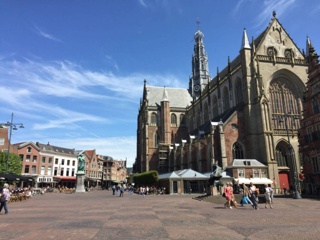 The exterior of the St. Bavo Church in Haarlem on a sunny day