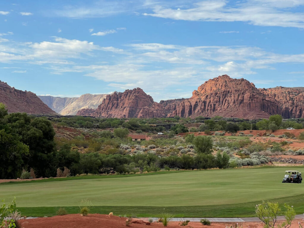 Panoramic view of the stunning red rocks and the overlooking golf course in St. George