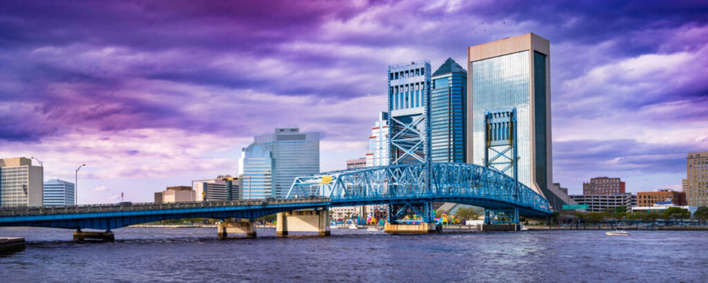 Picturesque purple skies over the skyline and St. Johns river