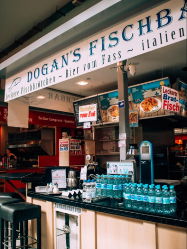View of a food stand at the Marheineke Markthalle