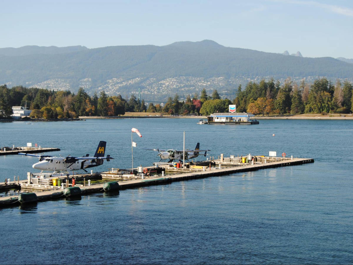 Scenic views of the Stanley Park and the North Shore Mountains from Coal Harbour