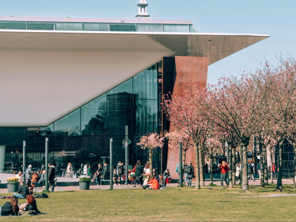 People relaxing outside Stedelijk Museum