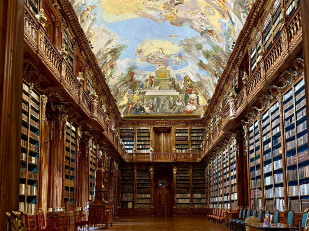 View of the beautiful painting on the ceiling of The Philosophical Library Hall in Strahov Monastery