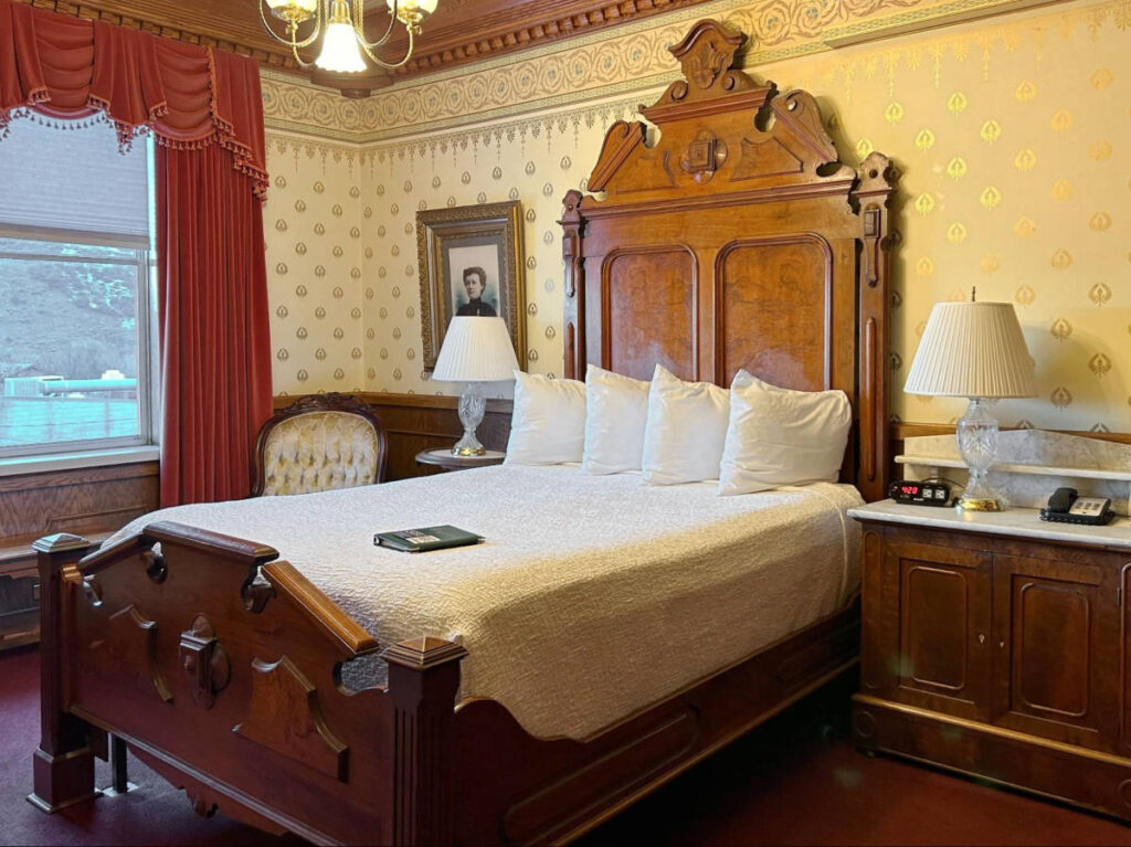 The huge bed in the room in Strater Hotel
