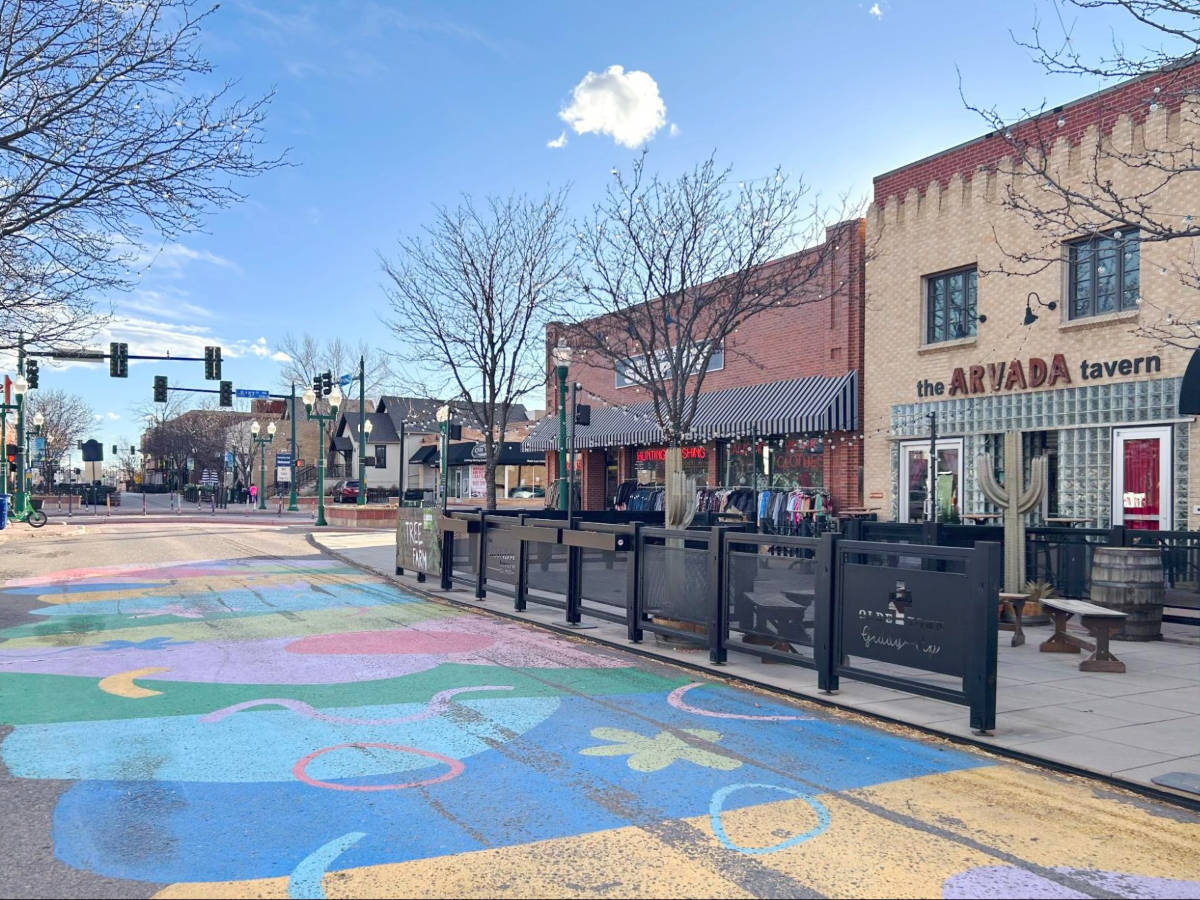 A colorful mural along the street in Olde Town