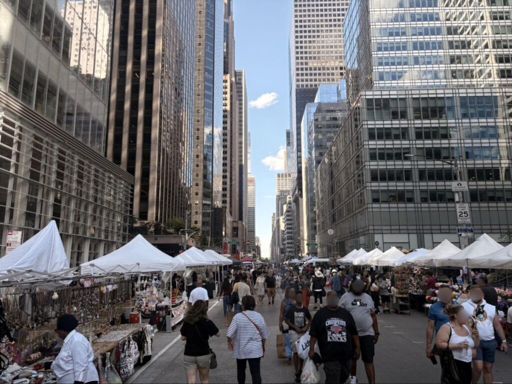 A bustling street fair in Midtown Manhattan